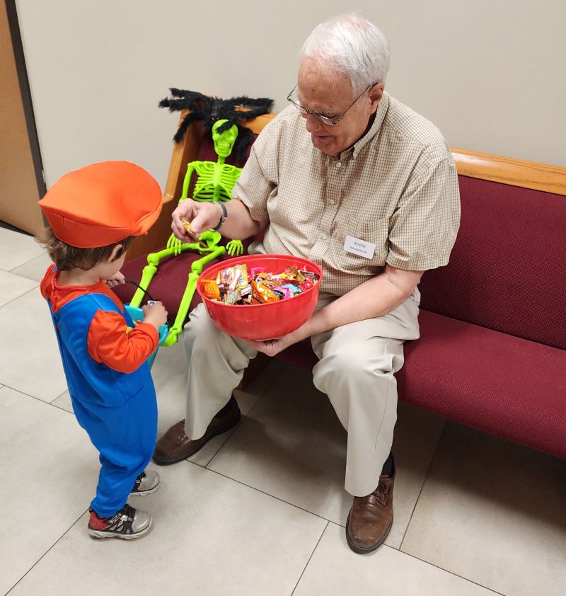 child trick or treating at Halloween parade