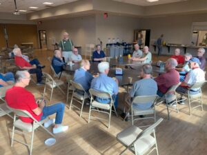 Pastor leading Men's breakfast group